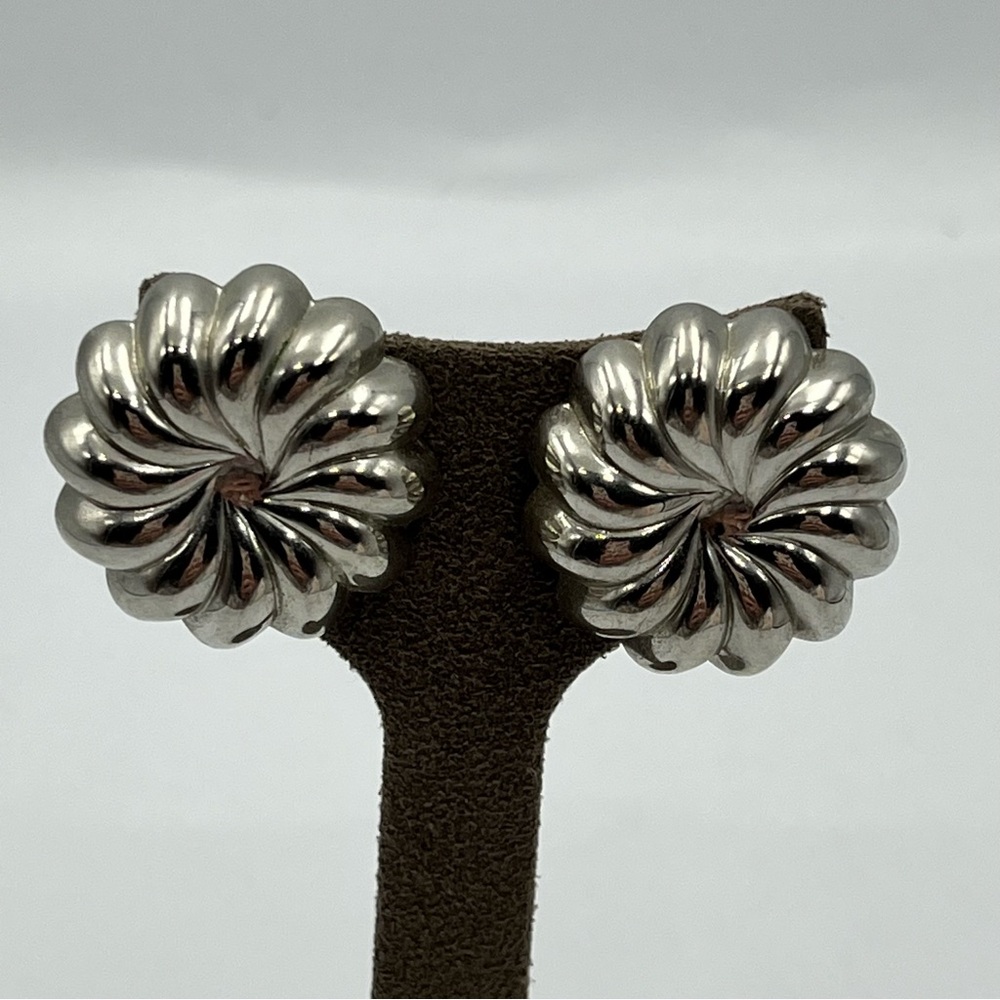 Woman’s Silver tone pierced Floral Sculptural Earrings